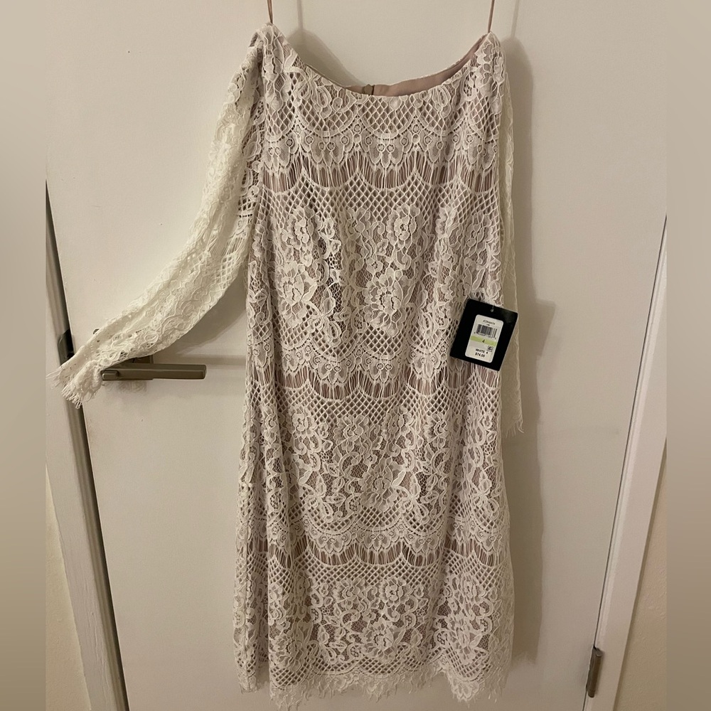 White lace three-quarter sleeve dress